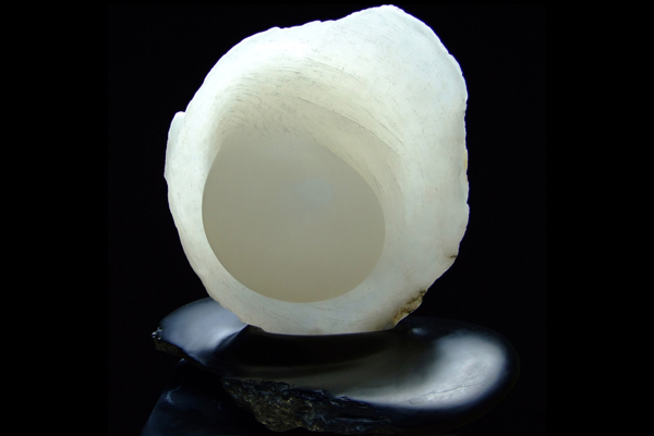 Collision, white alabaster with slate base by Mel Fraser, contemporary stone sculpture